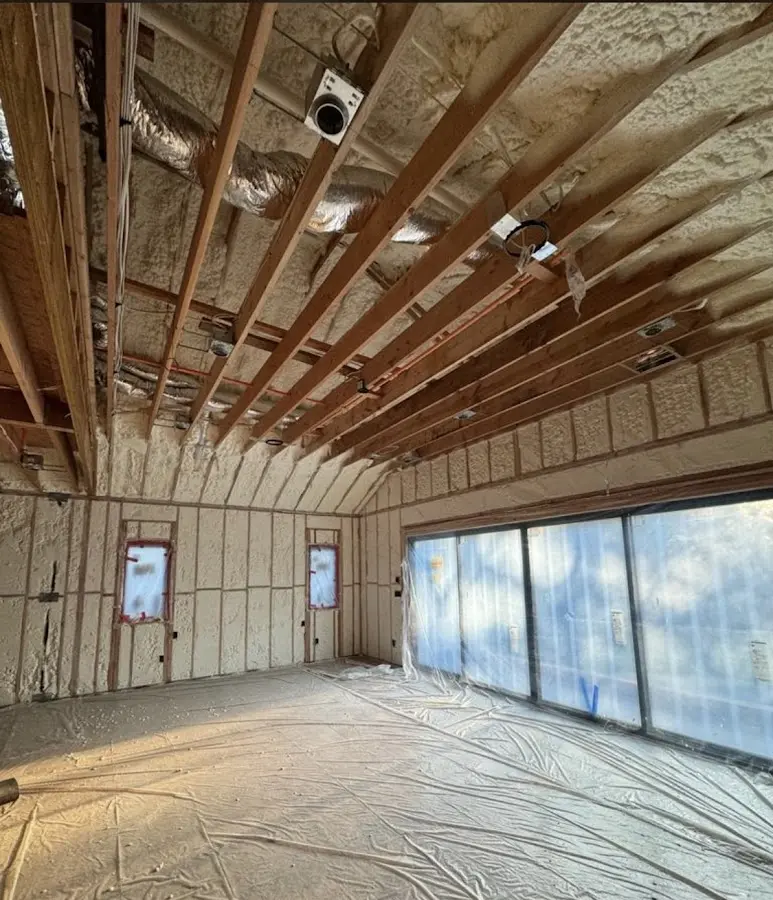 Interior walls and ceiling insulated with spray foam during new construction in Chardon